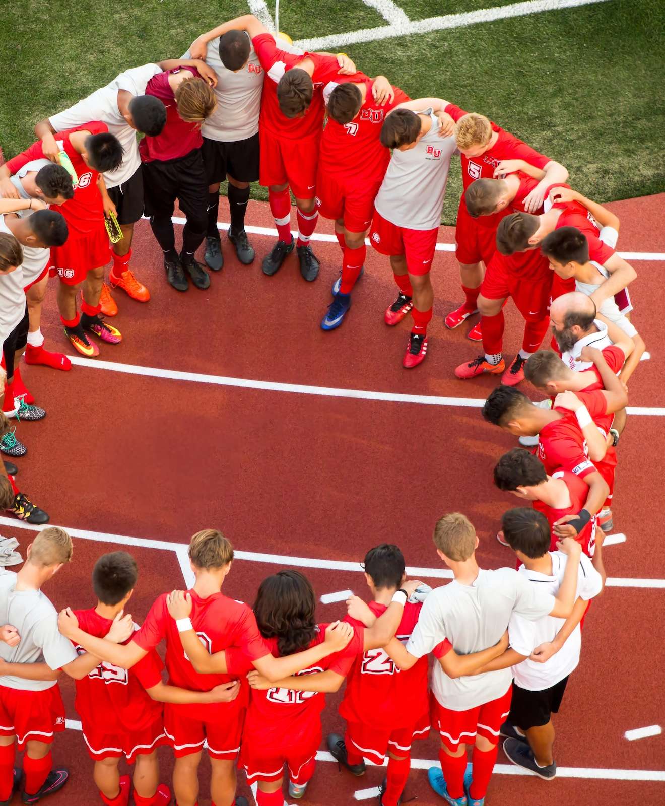 Aerial photo of soccer players huddling